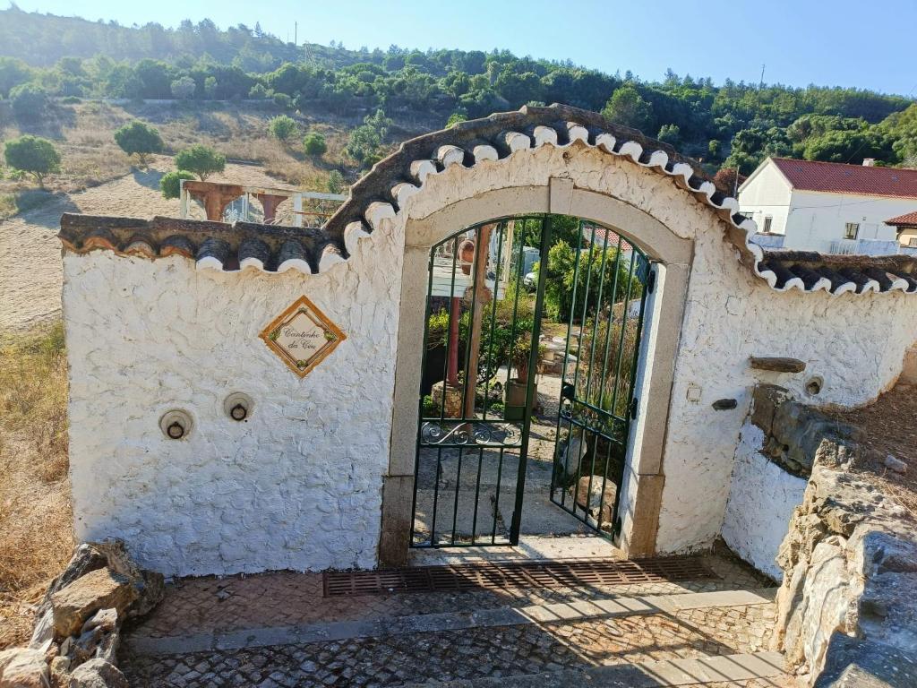 an entrance to a building with a gate at Heaven House in Sesimbra