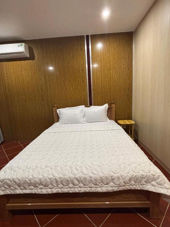 Postel nebo postele na pokoji v ubytování Homestay Xóm Quê