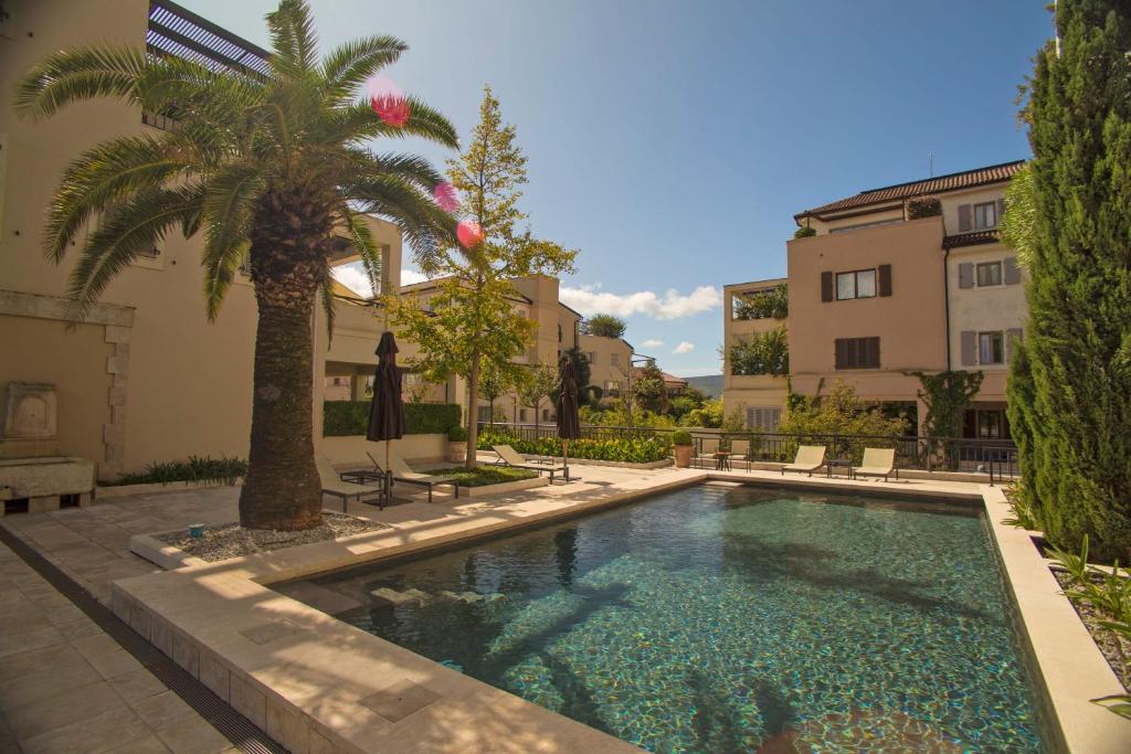 Bazén v ubytování Porto Montenegro Zeta 102 - Cozy Studio nebo v jeho okolí