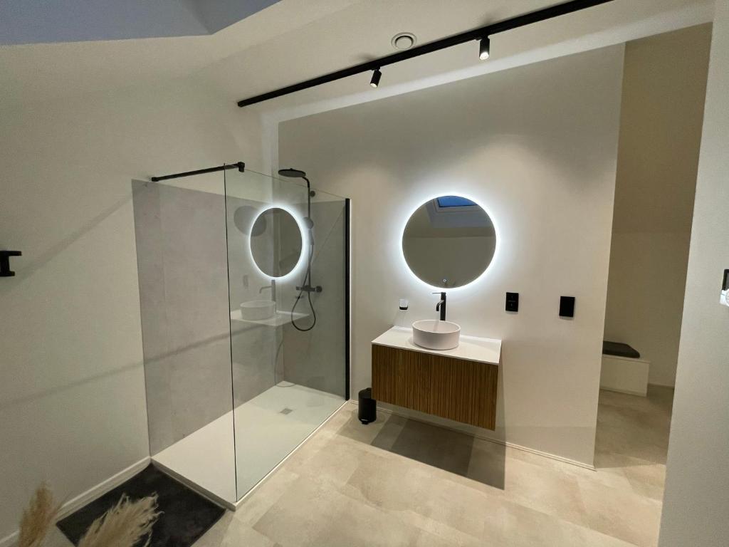 Koupelna v ubytování Le loft du coiffeur