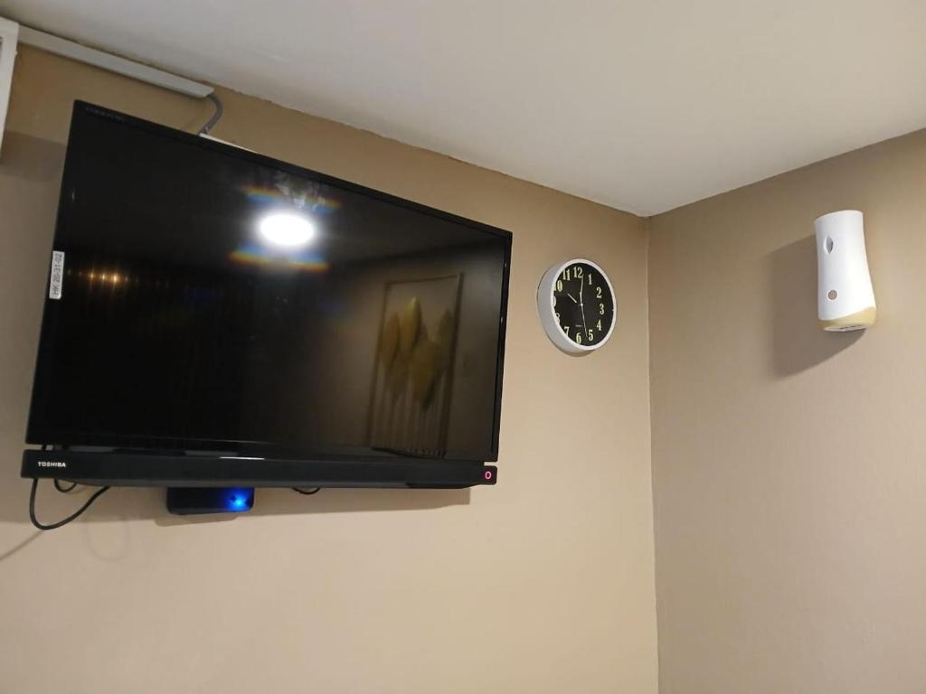 TV a/nebo společenská místnost v ubytování SS Grey House Bukit Bintang