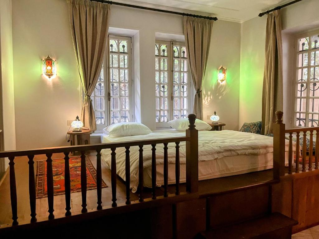 Llit o llits en una habitació de Villa Layla