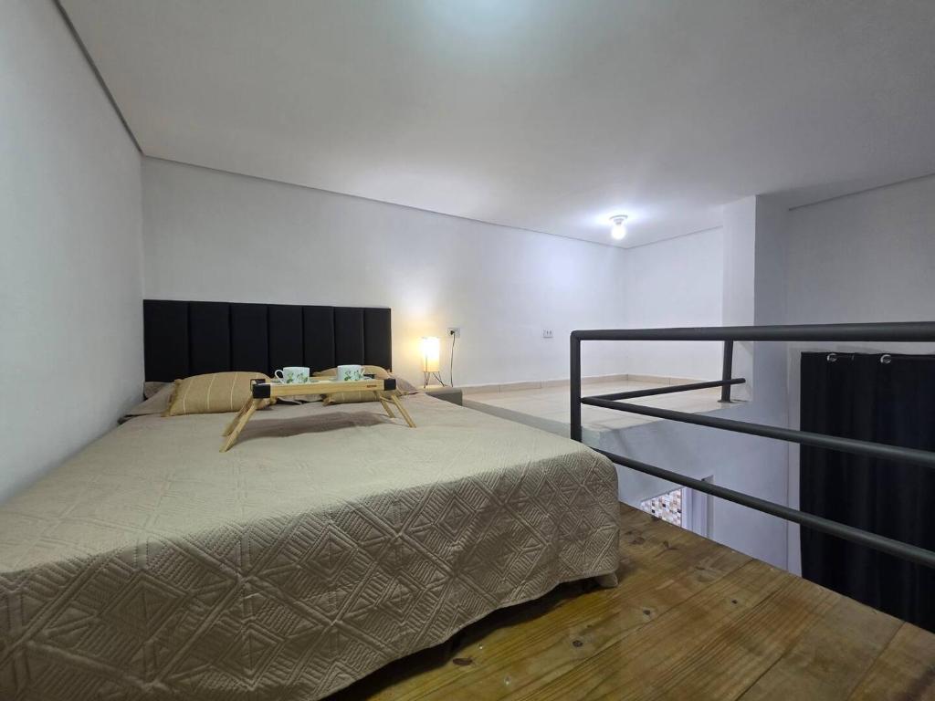 Katil atau katil-katil dalam bilik di Guaracuí Flat House