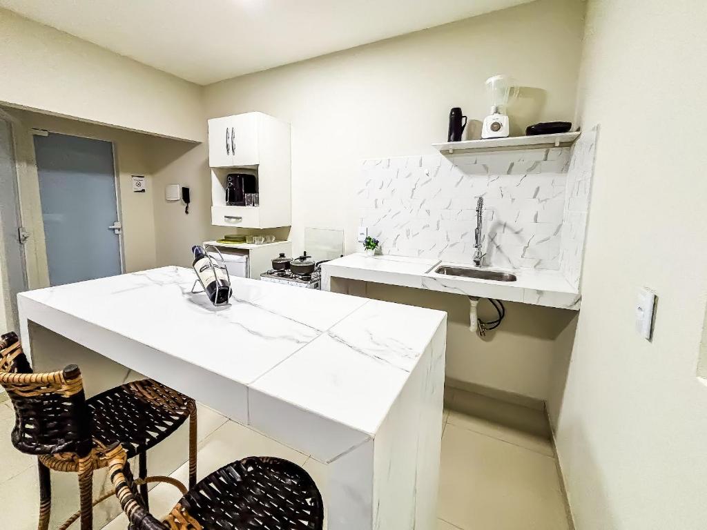 A cozinha ou kitchenette de Vila Imper Host Balsas- Apês com Wi-fi I A/C a 3 min. do Mix Mateus