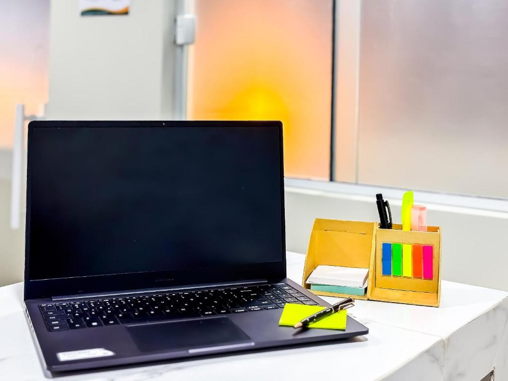 Uma televisão e/ou sistema de entretenimento em Vila Imper Host Balsas- Apês com Wi-fi I A/C a 3 min. do Mix Mateus