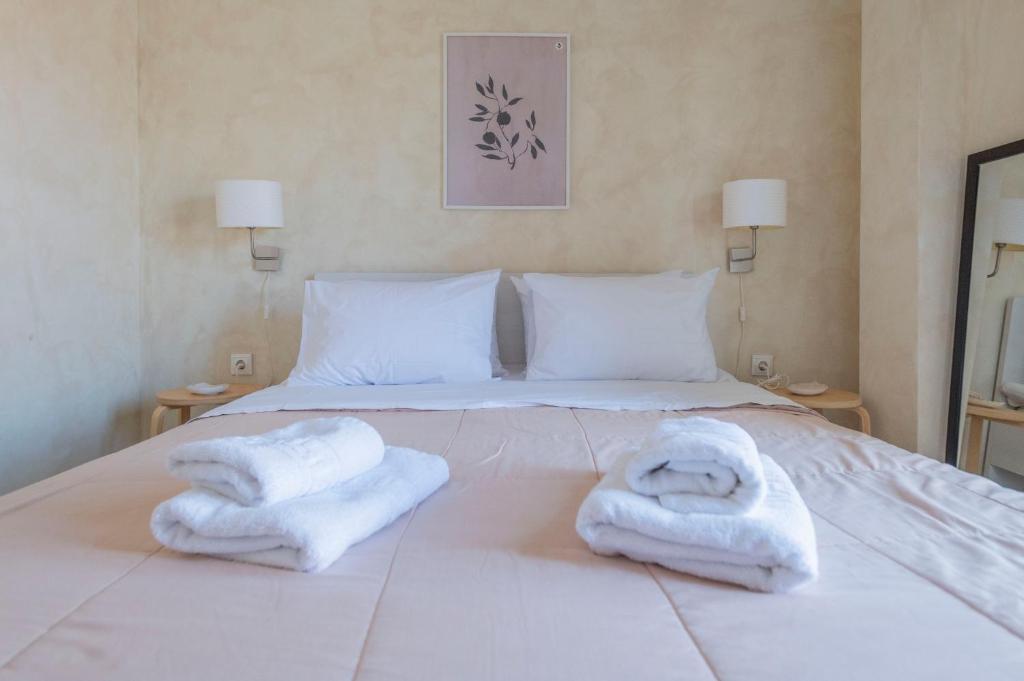 Postel nebo postele na pokoji v ubytování Maisonette Pylos