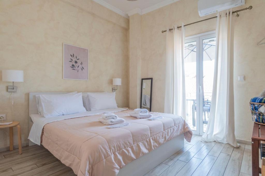 Postel nebo postele na pokoji v ubytování Maisonette Pylos