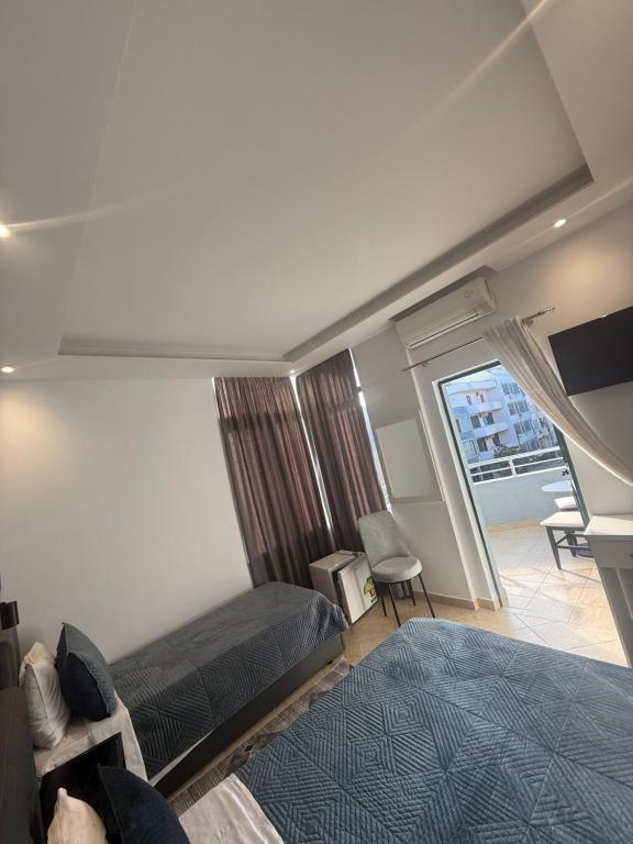 TV a/nebo společenská místnost v ubytování Hotel Riviera