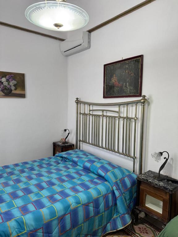 Postel nebo postele na pokoji v ubytování Le Macine 1868