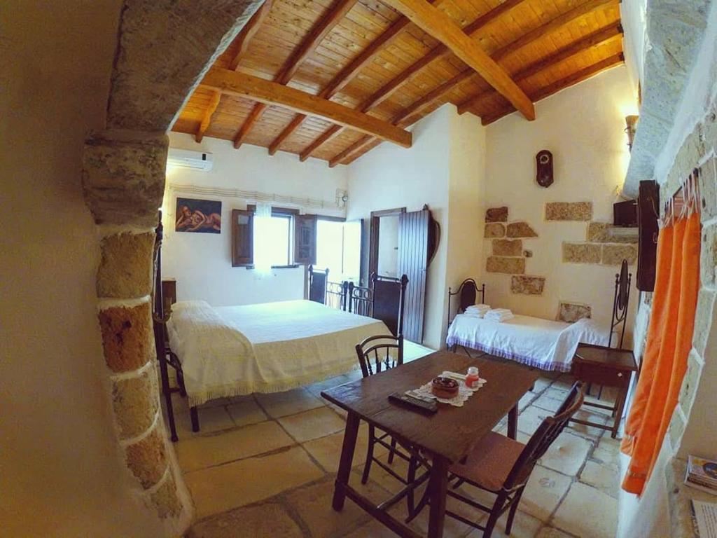 Postel nebo postele na pokoji v ubytování B&B Pergulea