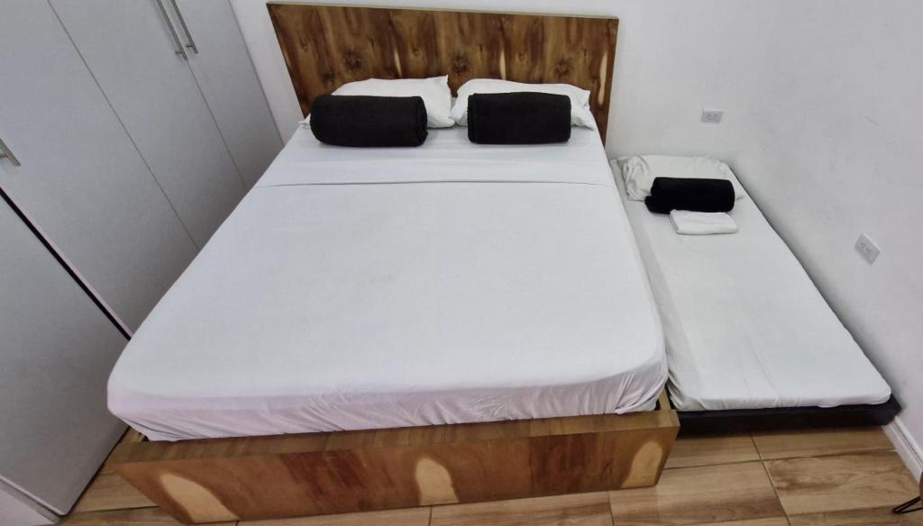 Voodi või voodid majutusasutuse Three House Hostel Boutique toas