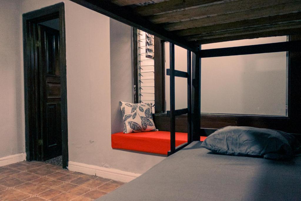 Postel nebo postele na pokoji v ubytování Chillout Hostel Barrio Escalante