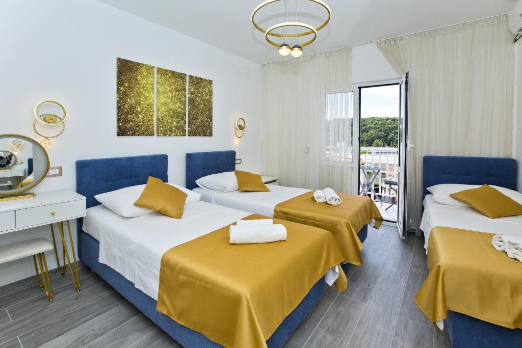 Postel nebo postele na pokoji v ubytování Villa Zorana hostel