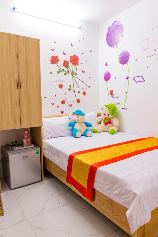 Postel nebo postele na pokoji v ubytování Đức Dũng Hotel