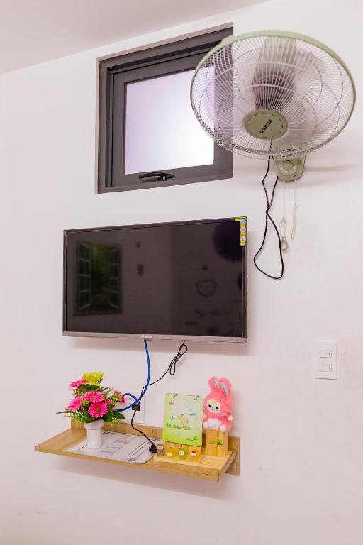 TV a/nebo společenská místnost v ubytování Đức Dũng Hotel