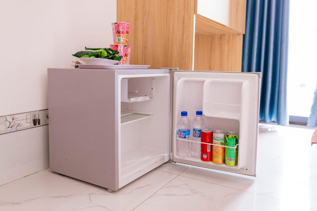 Kuchyň nebo kuchyňský kout v ubytování Đức Dũng Hotel