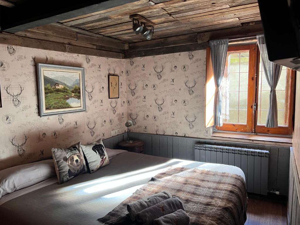 Postel nebo postele na pokoji v ubytování Cabane Du Cerf