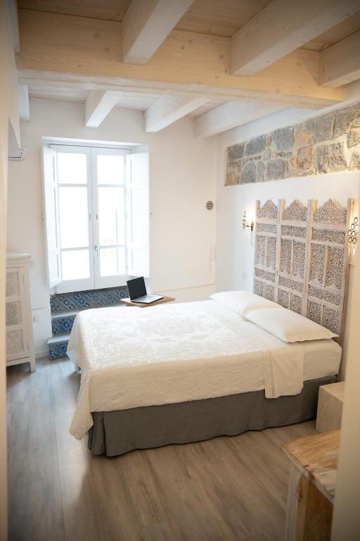 Postel nebo postele na pokoji v ubytování B&B Terra - Stanza Viaggio