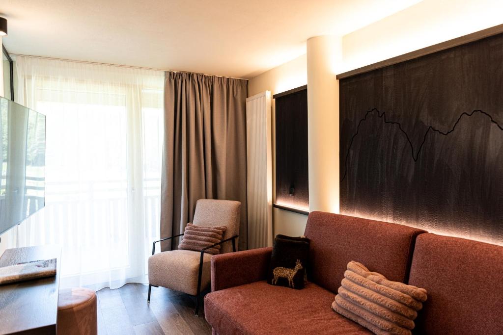 Posezení v ubytování Hotel Pinei