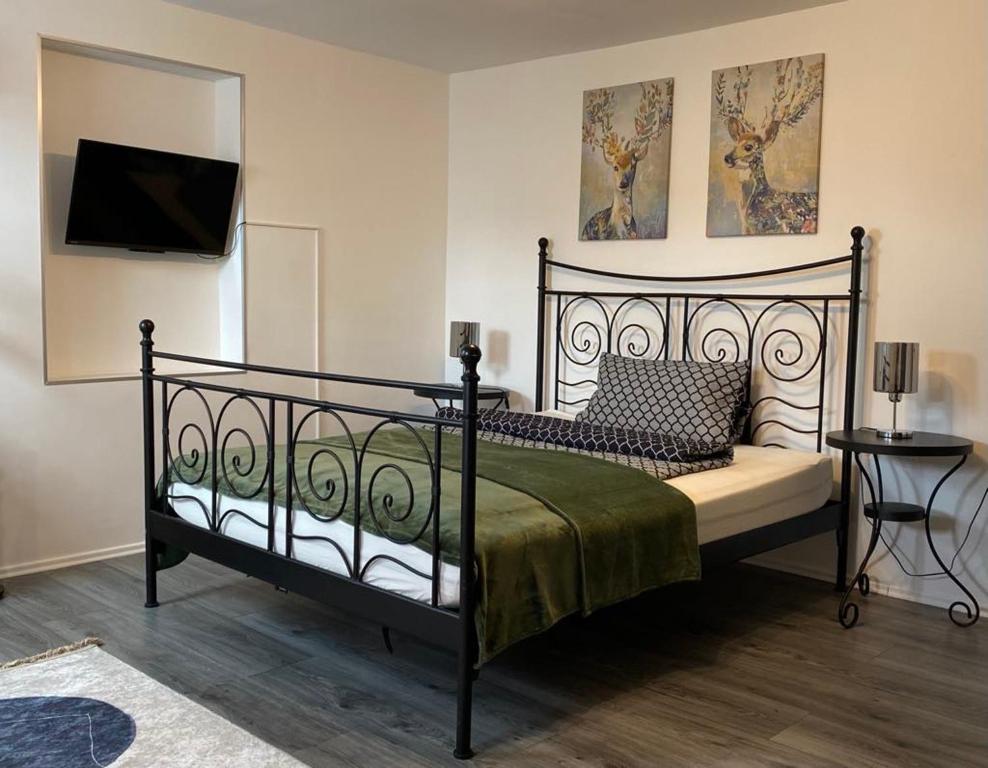 Postel nebo postele na pokoji v ubytování Zentrum der Ruhe - Appartment