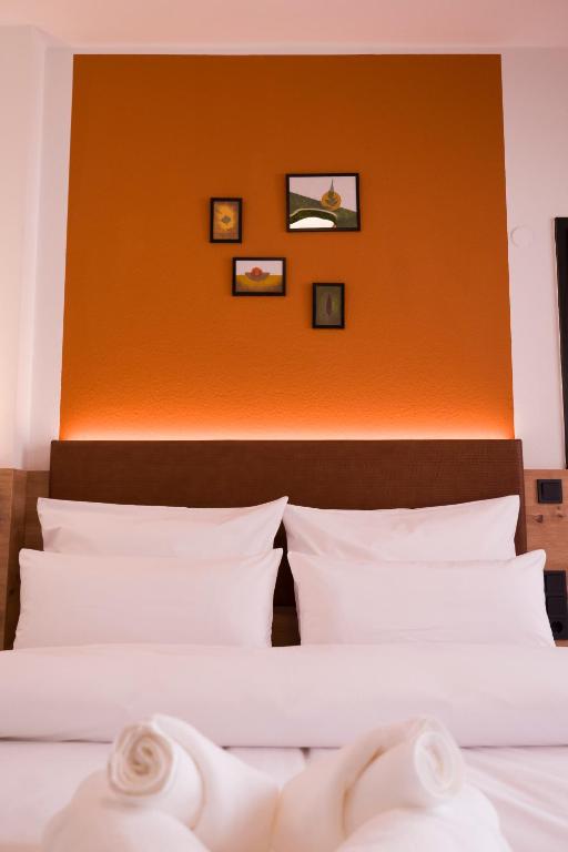 Postel nebo postele na pokoji v ubytování Hotel Sandkorn