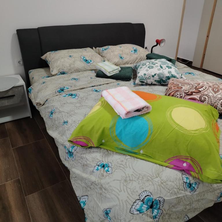 Postel nebo postele na pokoji v ubytování Apartman5