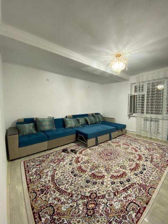 Posezení v ubytování Однокомнатная квартира в Туркестане