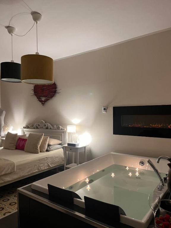 a living room with a tub in the middle of a room at La Corte dei Prefetti di Vico Bellavista Relax in Ronciglione