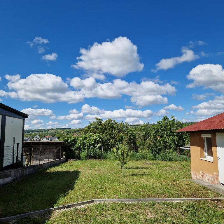 a view from the back yard of the house at Buborék Pihenőház - Etyek in Etyek