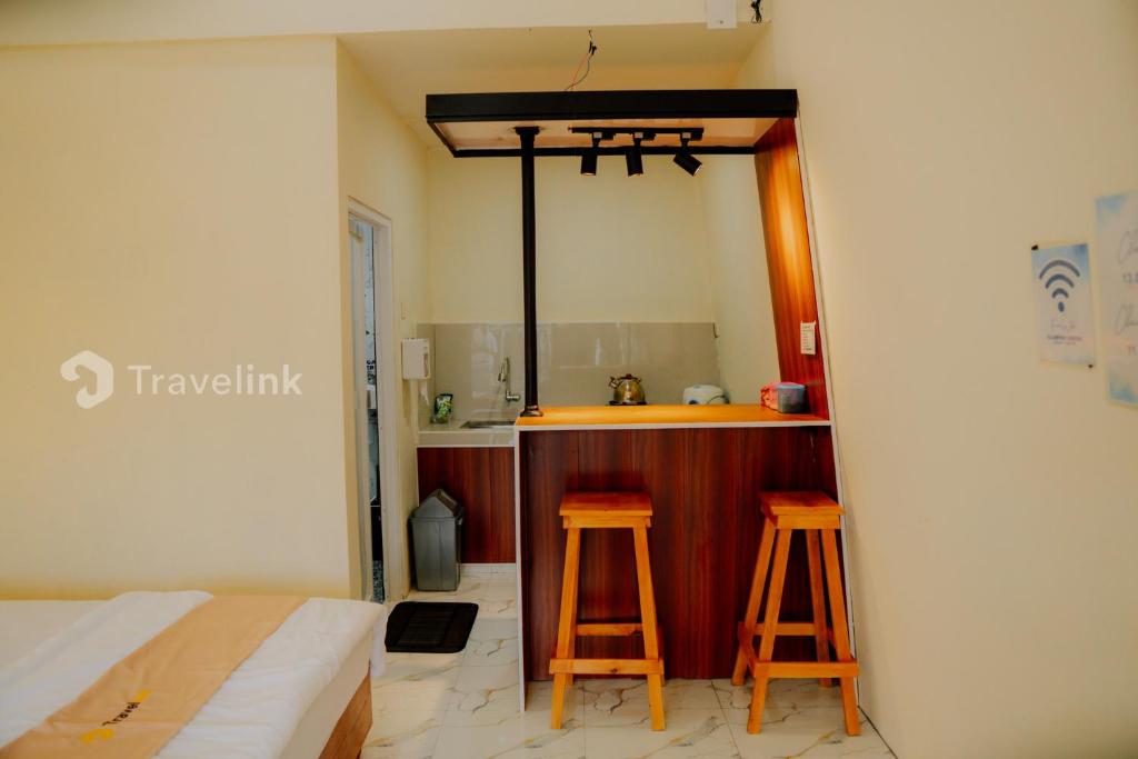 Postel nebo postele na pokoji v ubytování Dieng Luxury Camp By Travelink
