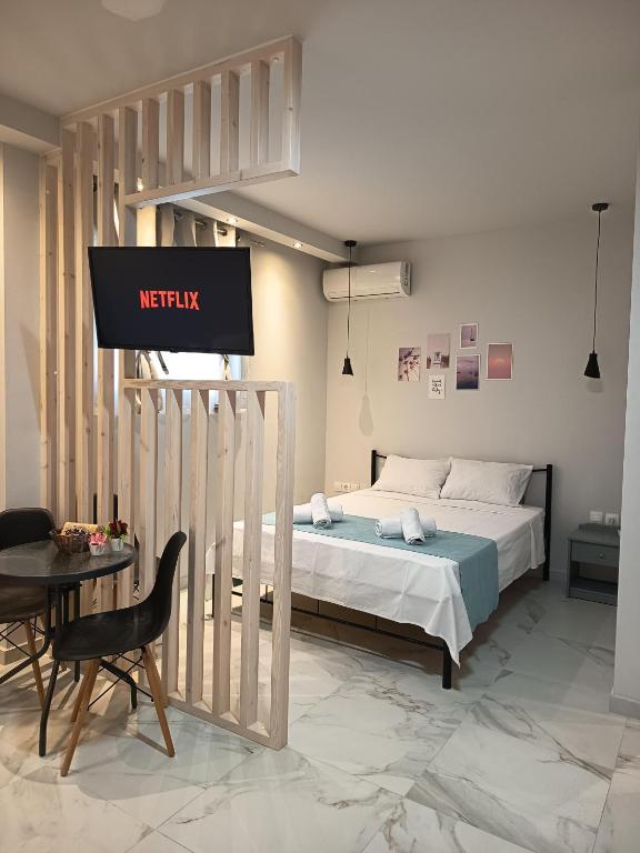 Postel nebo postele na pokoji v ubytování Iris House