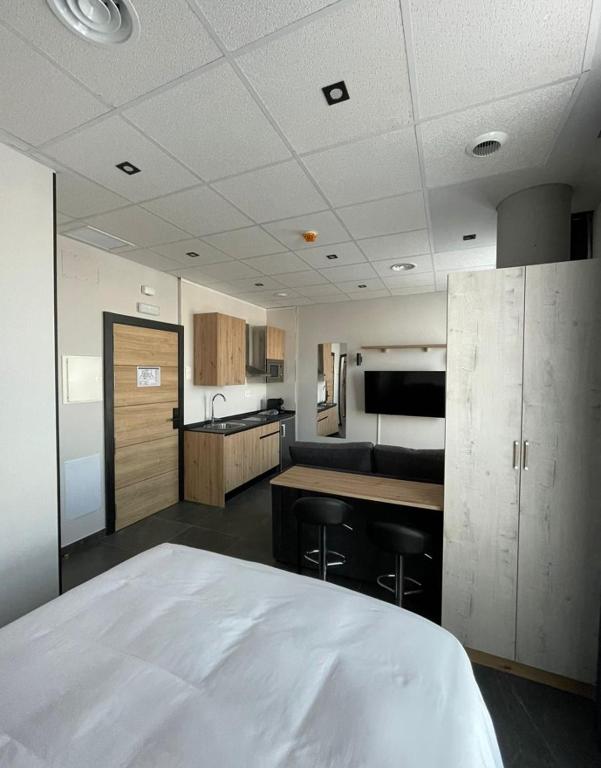 Kuchyň nebo kuchyňský kout v ubytování Apartamentos - Mirasur