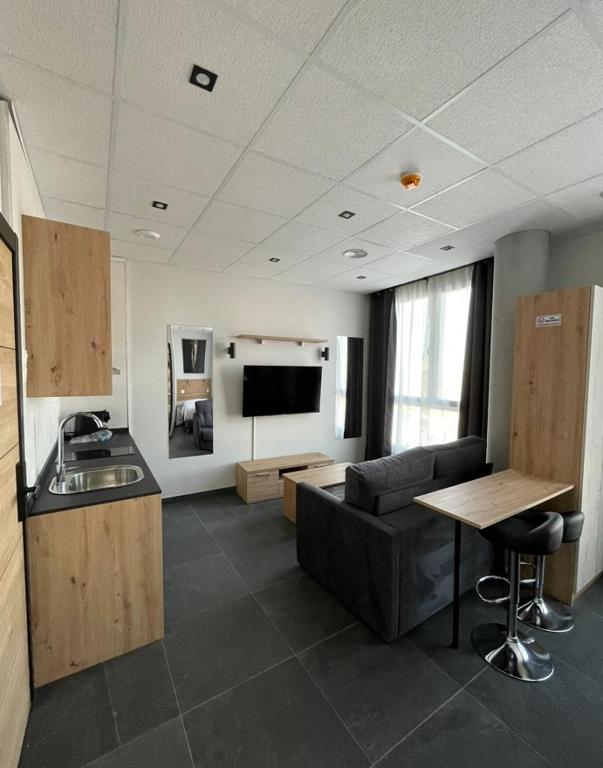 Kuchyň nebo kuchyňský kout v ubytování Apartamentos - Mirasur