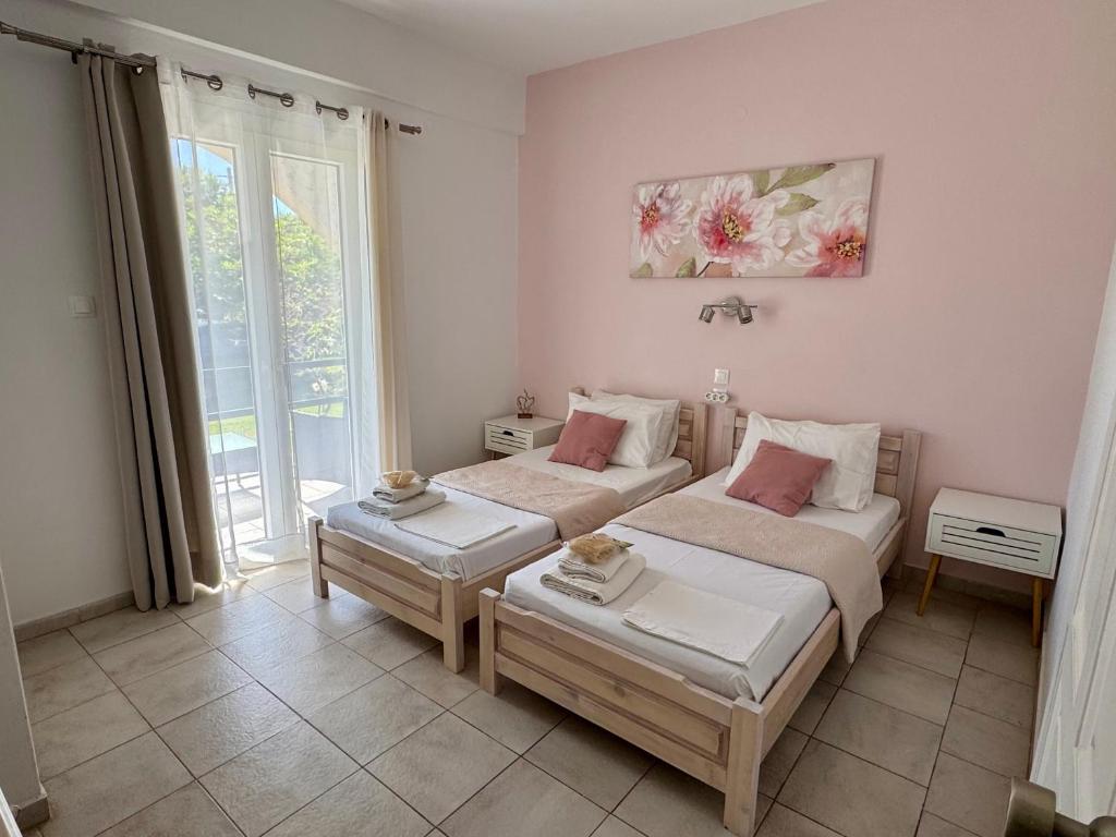 Postel nebo postele na pokoji v ubytování Sungate Villas