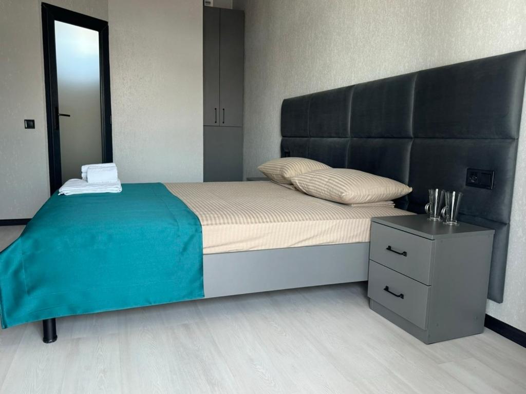 Postel nebo postele na pokoji v ubytování VIP HOTEL ZATOKA