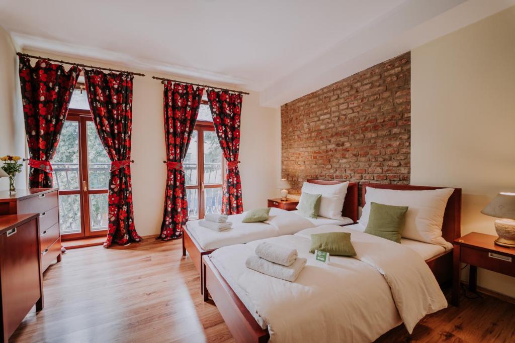 Postel nebo postele na pokoji v ubytování Eco Friendly Hotel Dália