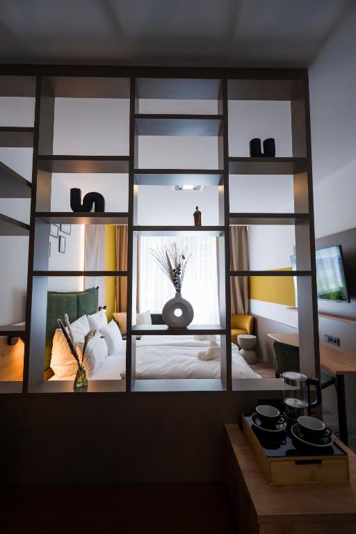 TV a/nebo společenská místnost v ubytování Hotel Sandkorn