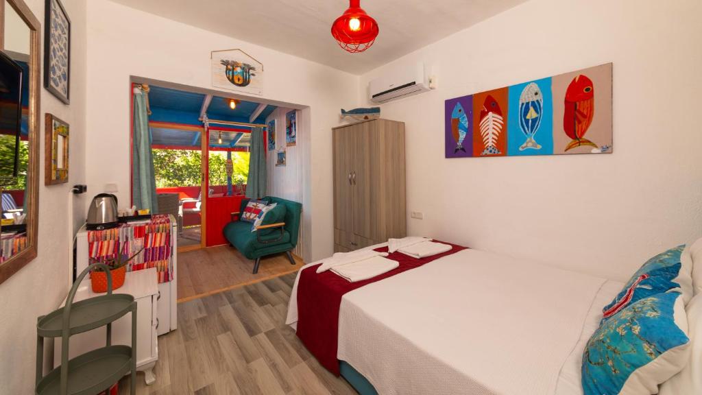 Postel nebo postele na pokoji v ubytování Derin Mavi Suit Butik Otel