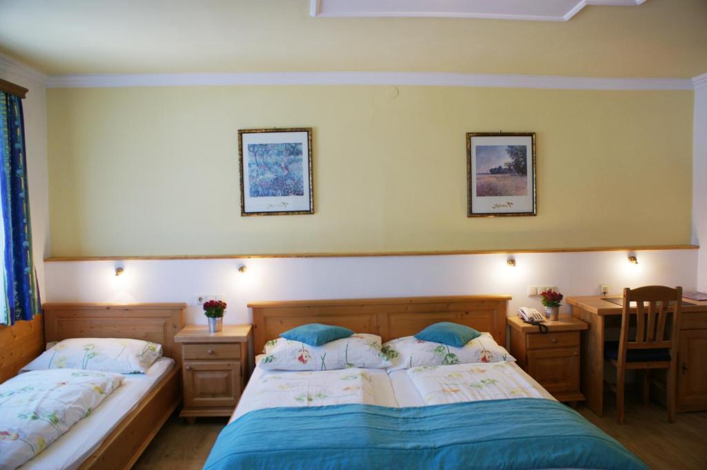 Postel nebo postele na pokoji v ubytování Hotel Apartment Das Au- Gut