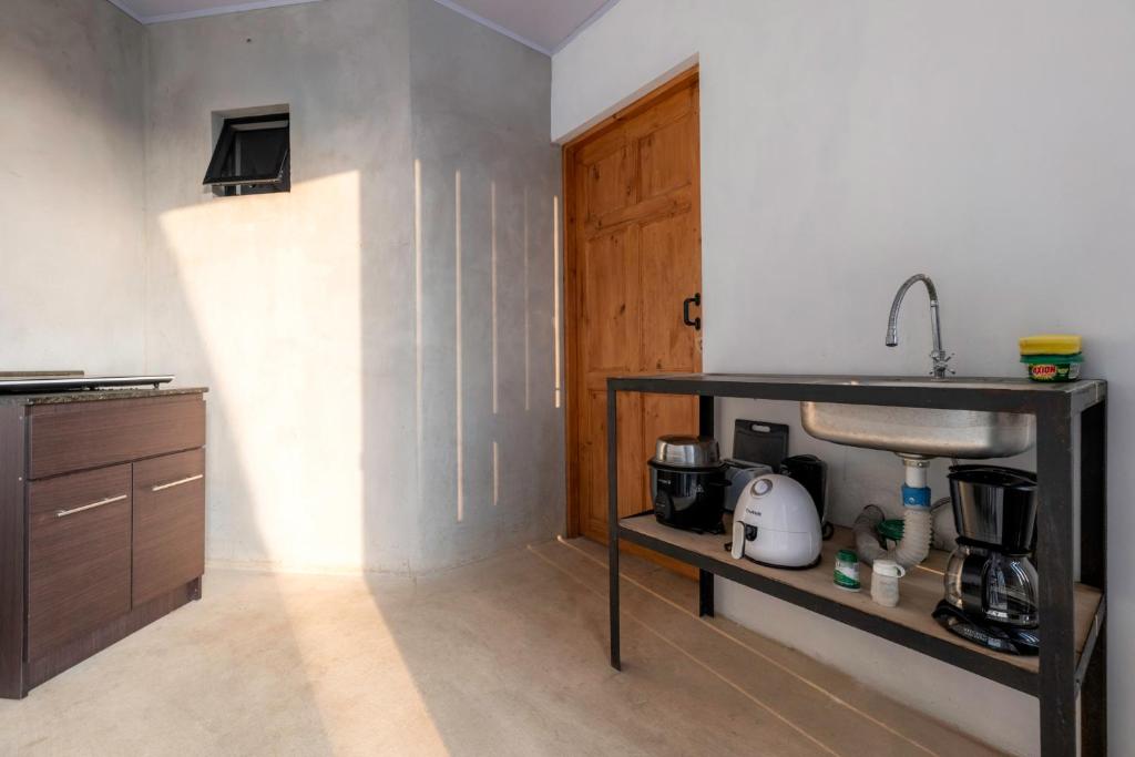 Kuchyň nebo kuchyňský kout v ubytování Zen Studio