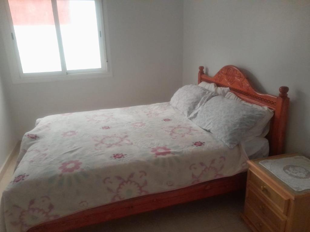 Voodi või voodid majutusasutuse Alhoceima Appartement Loft toas