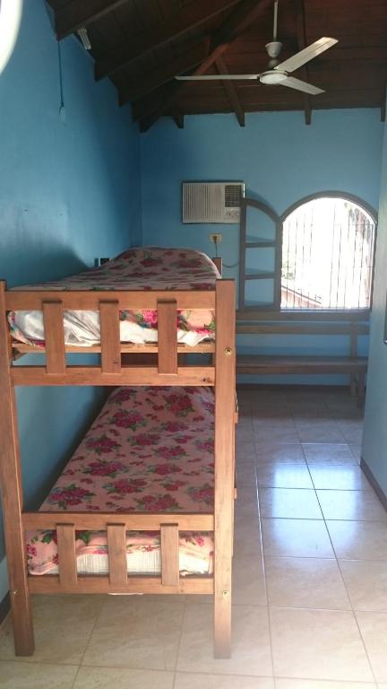 Postel nebo postele na pokoji v ubytování Hostel Iguazu Falls