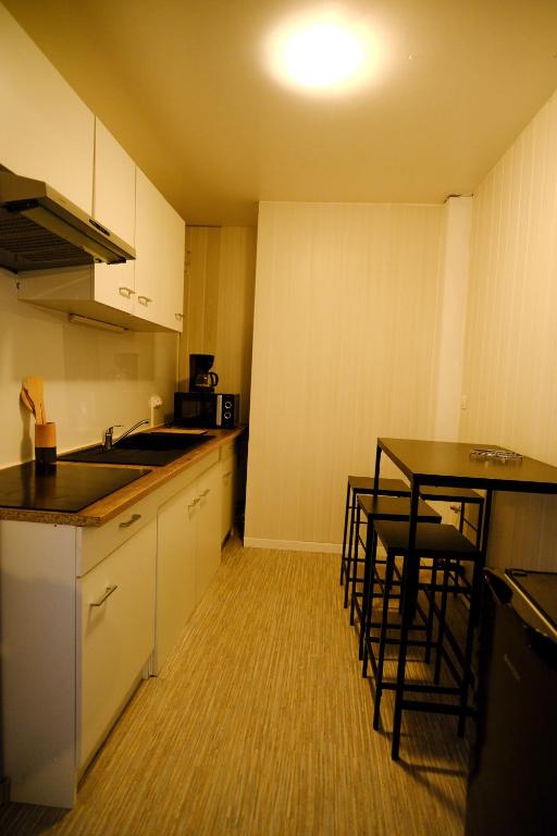 Kuchyň nebo kuchyňský kout v ubytování Auberge Des 3 Lacs