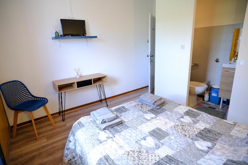 Postel nebo postele na pokoji v ubytování Auberge Des 3 Lacs
