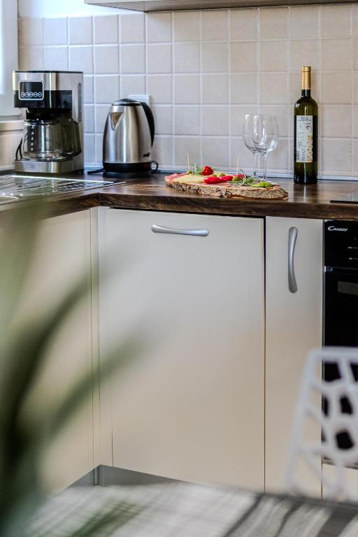 Kuchyňa alebo kuchynka v ubytovaní Apartman Elephant