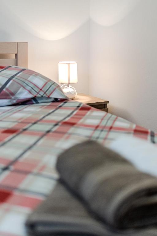 Posteľ alebo postele v izbe v ubytovaní Apartman Elephant