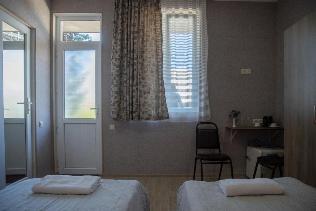 Letto o letti in una camera di Pavillion Guest House