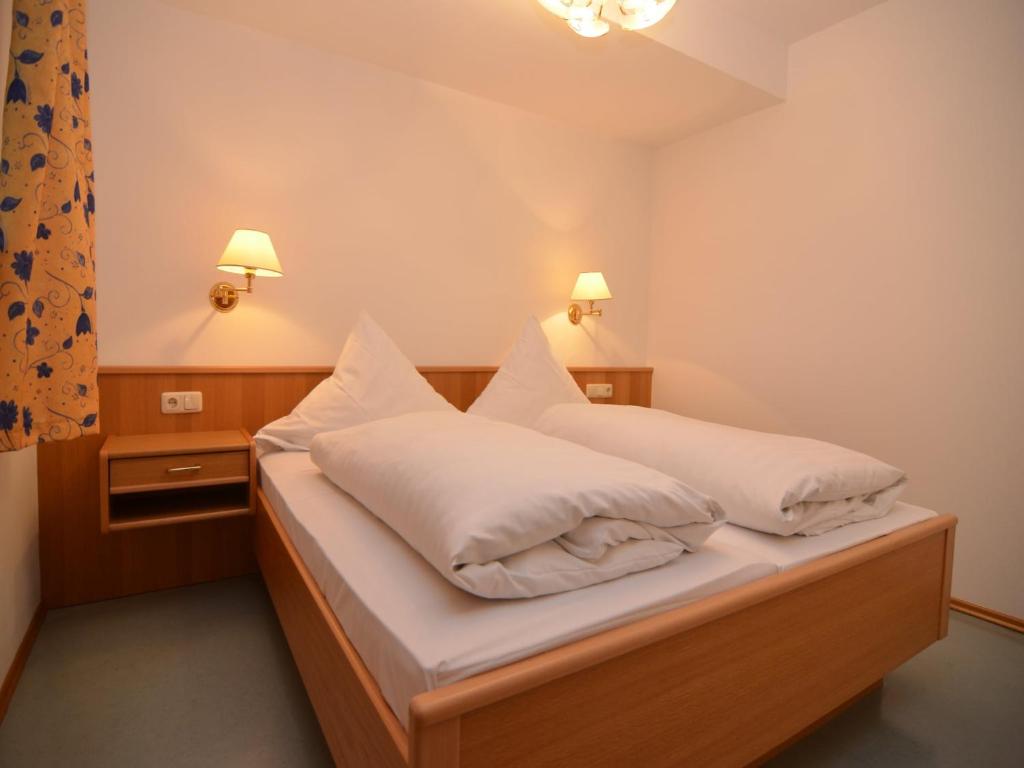 Postel nebo postele na pokoji v ubytování Comfortable Apartments in Rotthalmünster