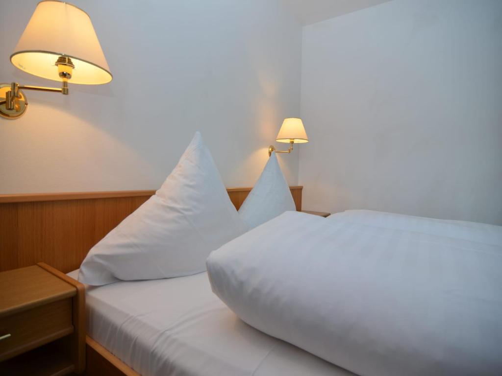 Postel nebo postele na pokoji v ubytování Comfortable Apartments in Rotthalmünster