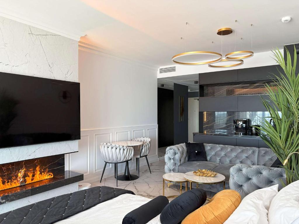 Posezení v ubytování Sea View Smart & Garden VIP Apartment